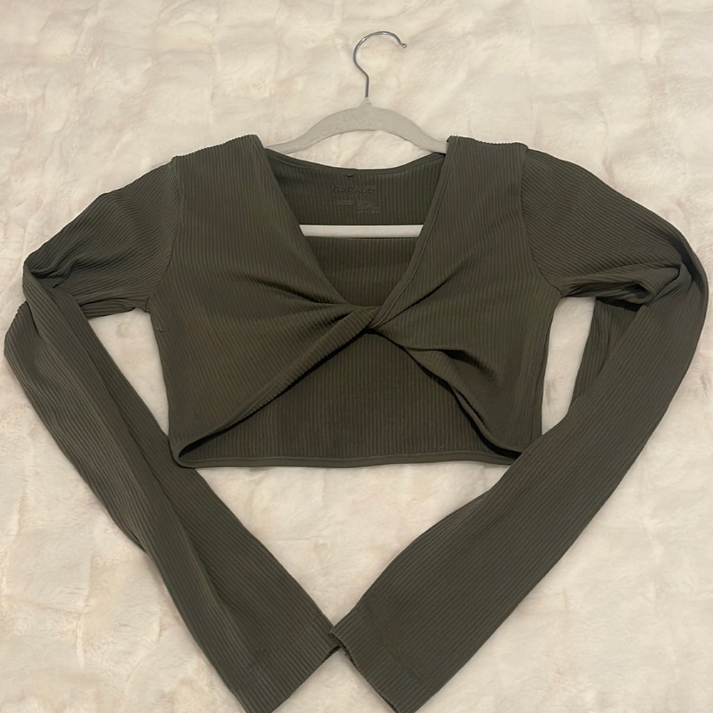 Gently worn, army green, long sleeve, crop top with twist in center from Garage